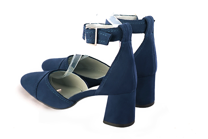 Navy blue women's open side shoes, with a strap around the ankle. Round toe. Medium flare heels. Rear view - Florence KOOIJMAN